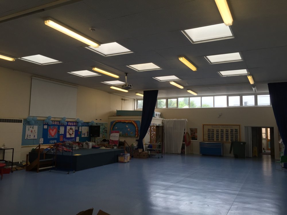 Dimly lit main hall before LED upgrade