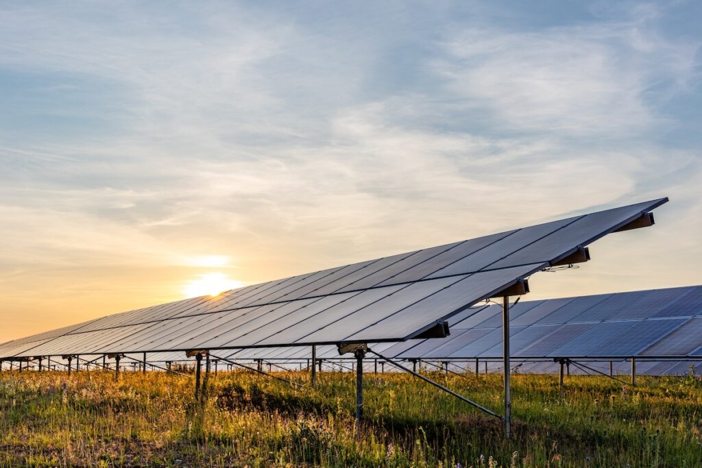 Ground mounted solar panels in a field