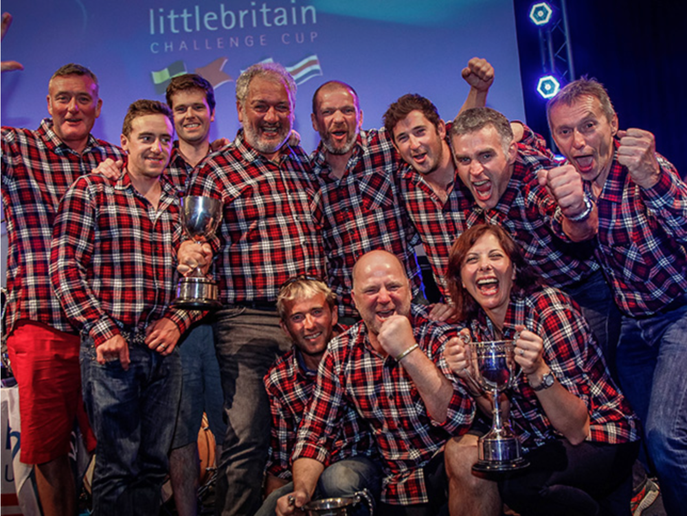 Brightspark Littlebritain Challenge cup team winning a trophy